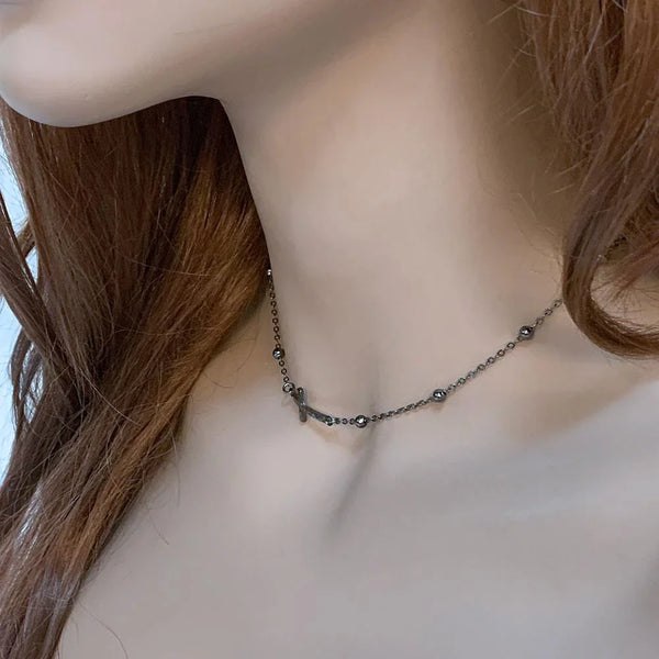 Gunmetal Chain Sideways Cross Necklace