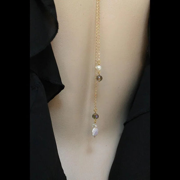 Long Gold Lariat Necklace Backdrop with Pearls and Crystals