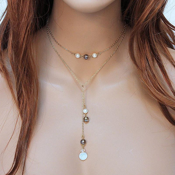 Long Gold Lariat Necklace Backdrop with Pearls and Crystals